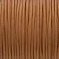 Nahaufnahme von einfarbigem Paracord 100 Typ I in Golden Copper Glamour als Meterware für feines DIY-Hundezubehör.